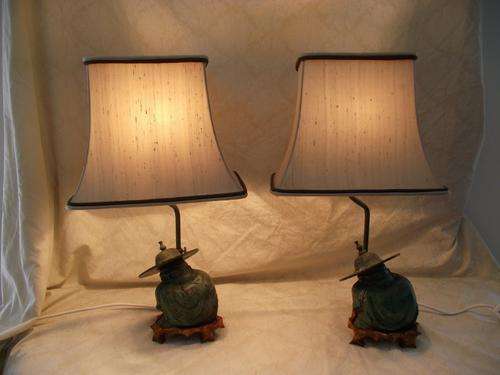 PAIR OF CAST IRON BUDDHA LAMPS